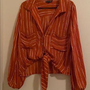 Never been worn Kivari tie front blouse.